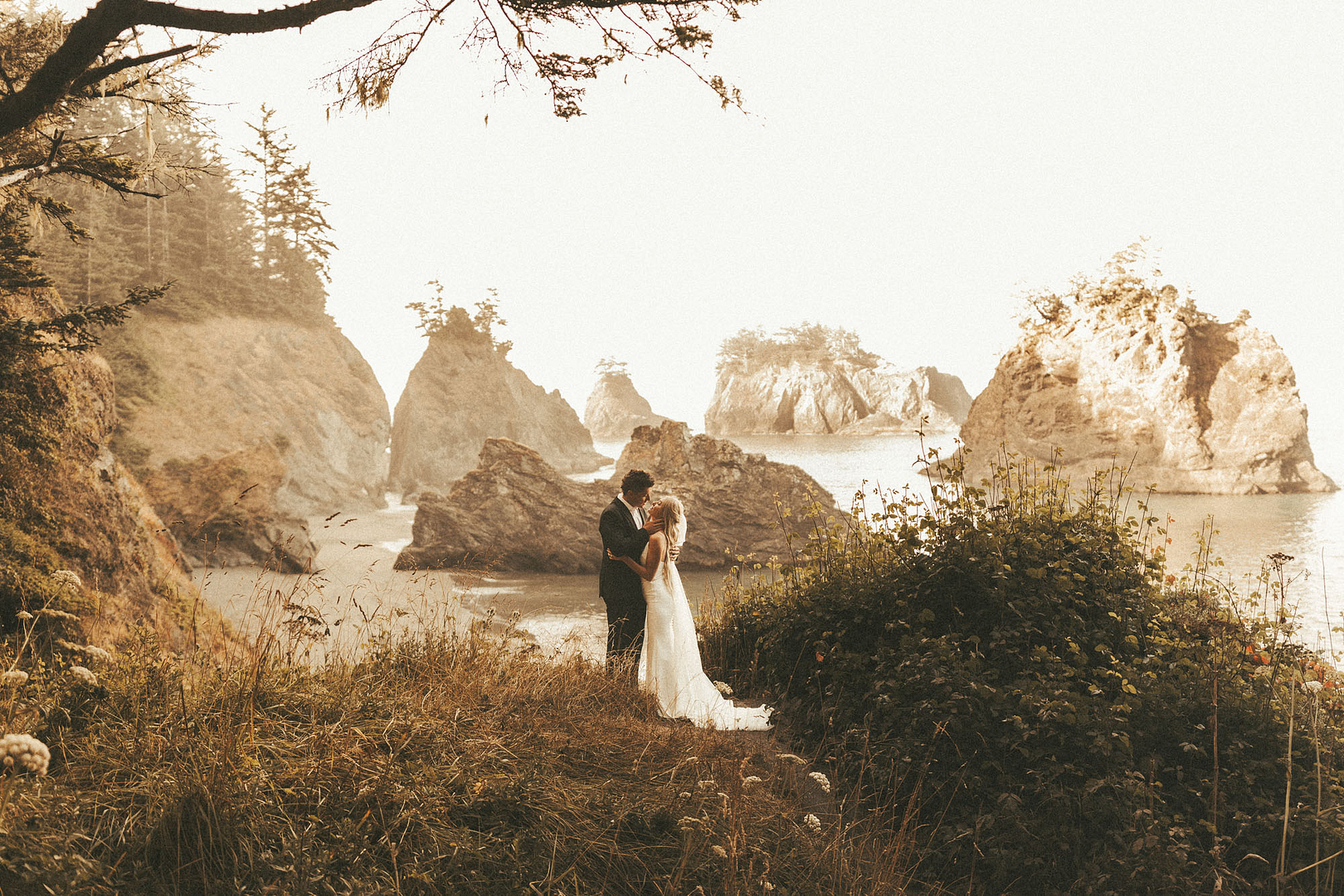 Destination wedding photography portraits with the sea as a backdrop